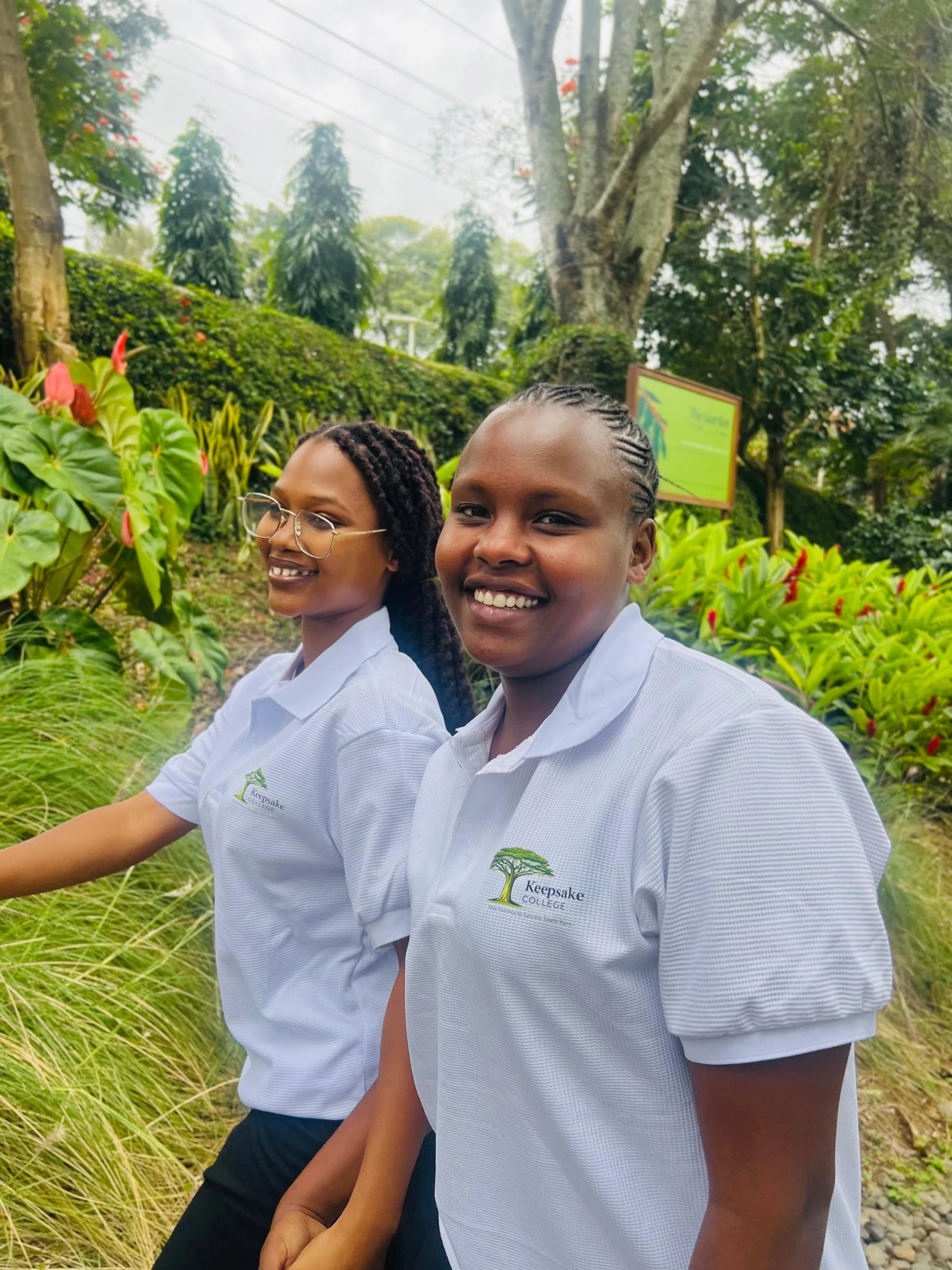 Two Keepsake students standing together in a garden